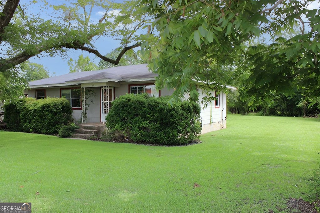 Photo of 111 Magnolia Street, Warwick, GA 31796 (MLS # 10855304)