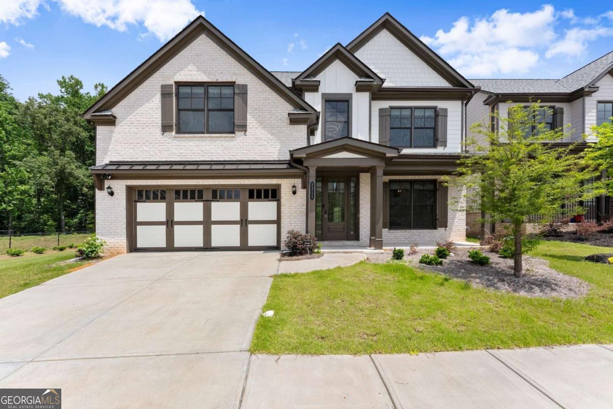 MOVE IN READY like-new 5 Bedrooms, 3 baths. Private in-law bedroom and bath on the main floor along with a formal dining room. The modern kitchen features a waterfall quartz countertop, gas cooktop and beautiful cabinets which opens to the breakfast area and the large family room. Spacious living areas, just right for the entire family. Huge oversized primary suite with sitting area, en-suite, and large walk-in closets. Laundry room upstairs for convenience and oversized comfortable secondary bedrooms. Brick front with brick water table around the entire house, 42-inch gas fireplace in family room, 10-foot ceilings on the main, and beautiful crown molding. Conveniently located near shopping and entertainment.