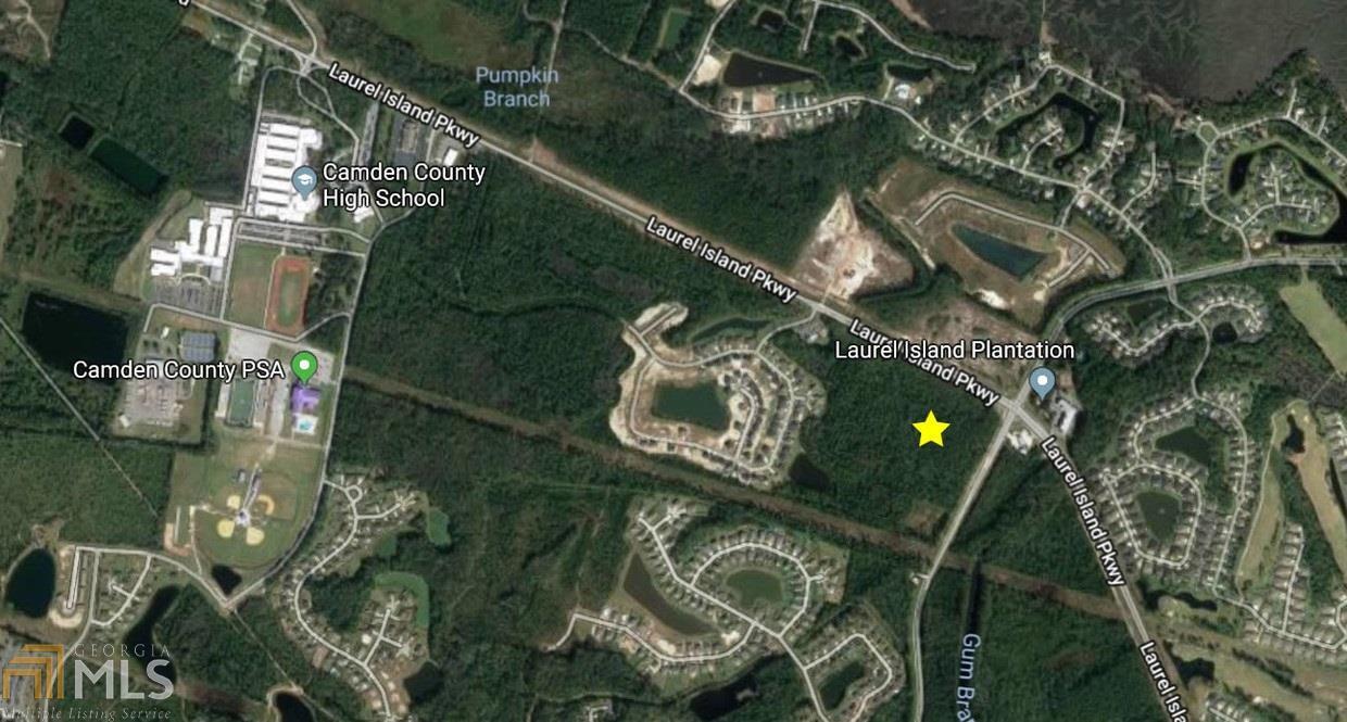 This property is a portion of parcel #107023. It has a total of 32 Upland acres. We will sell entire parcel or split up. Great location on corner of Laurel Island Parkway and Gross Rd. Laurel Island Parkway is already 4 lanes at the intersection in front of this property and is scheduled to be 4 laned out to I-95. Just across the street from Laurel Island Plantation w/ over 1,000 homes and many more to come. Only 2 miles from I-95 and 5 minutes from Kings Bay Naval Base. Zoned Hwy Commercial. Seller is willing to sell a portion of the lot.