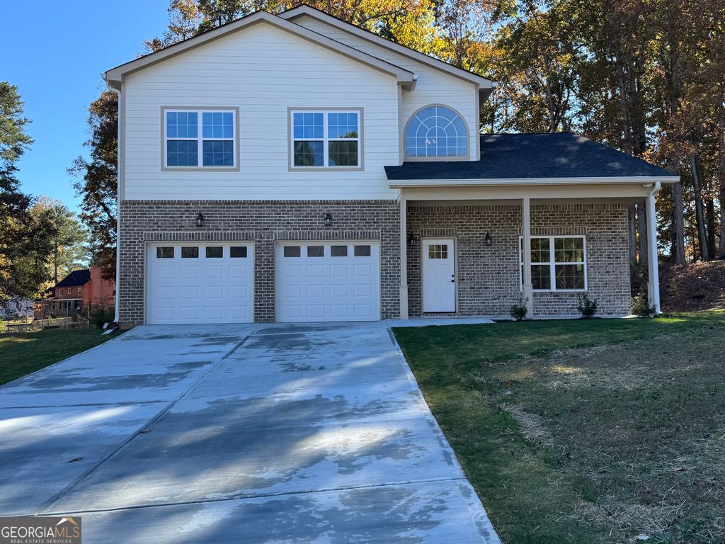 Photo of 6449 Rebecca Lou Lane, Lithonia, GA 30058 (MLS # 10652197)