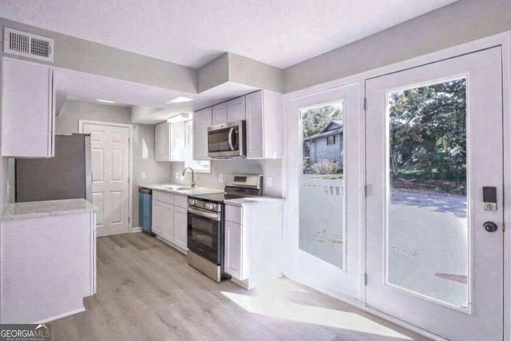 Photo of 3989 Darryl Lane, Gainesville, GA 30506 (MLS # 10673241)