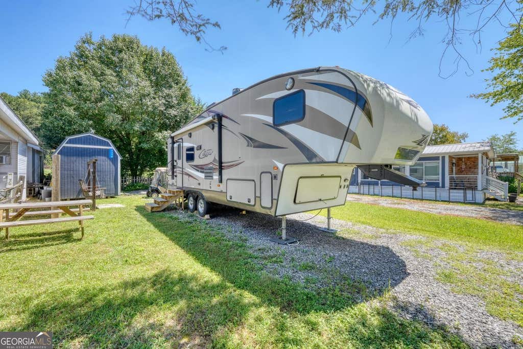 Photo of 4358 Riverbank Run RUN, Hiawassee, GA 30546 (MLS # 10833700)