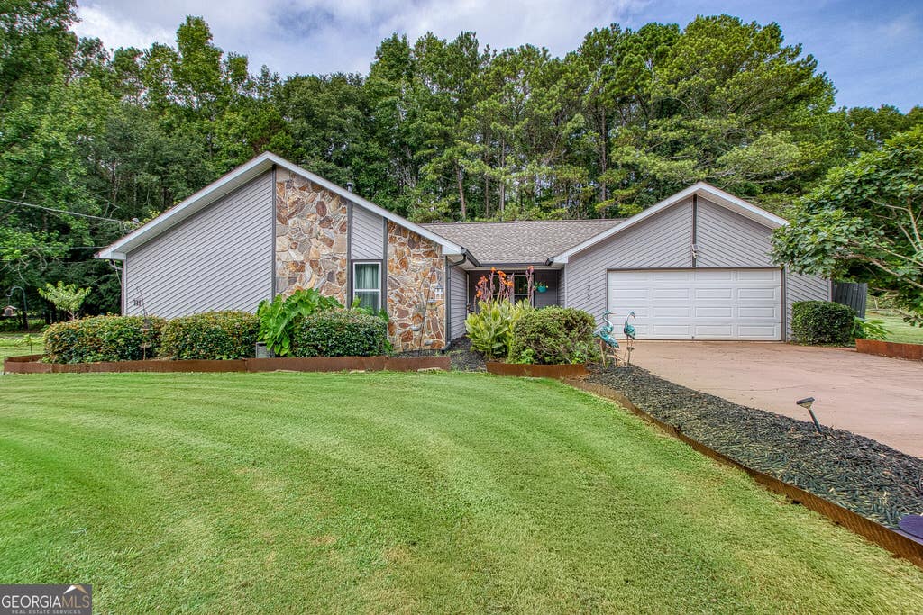 Photo of 125 Grandchester Way, Fayetteville, GA 30215 (MLS # 10807592)