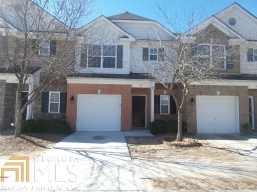Don't miss your opportunity to own this cozy townhome located on a quiet street in a well established neighborhood! This home features a fireplace in the living room, a private, fenced backyard, a walk-in closet in the master bedroom, and a spacious kitchen with a bar overlook into a breakfast nook with large windows - lots of natural light. Easy access to I -85. Close to lots of shopping and dining! Please download offer instructions and modified GAR from the listing. Sold in as-is condition.