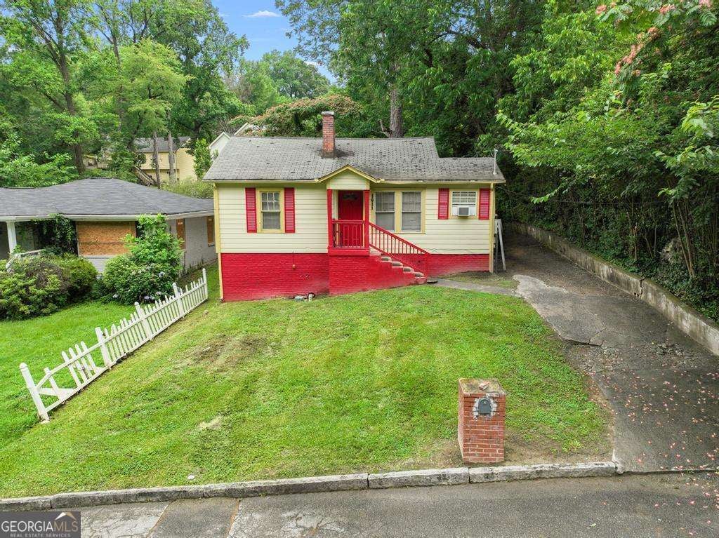 Photo of 1411 Lavender Drive NW, Atlanta, GA 30314 (MLS # 10784876)