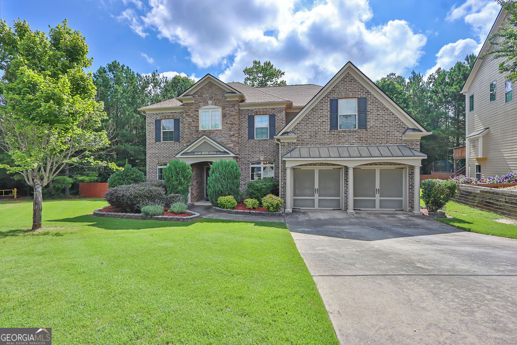 Located in the desirable Harbins Landings Estates subdivision in Dacula, GA, this spacious 4-bedroom, 3-bath home offers of well-designed living space on a quiet cul-de-sac lot. Built in 2007, the home welcomes you with a two-story foyer, flanked by a formal dining room on the right and a sitting room on the left. Just beyond is a guest bedroom with a full bath, ideal for visitors or a home office. The vaulted family room is filled with natural light from large windows and features a double-sided fireplace shared with the eat-in kitchen, which includes an island and flows seamlessly into the family room-perfect for entertaining and everyday living. Upstairs, you'll find three generously sized bedrooms, including a spacious primary suite with a large bathroom featuring double vanities and plenty of space to unwind. The fenced backyard includes a fire pit, creating the perfect spot for outdoor relaxation and gatherings. Conveniently located near top-rated schools and great shopping, this home offers both comfort and convenience. Schedule your showing today!