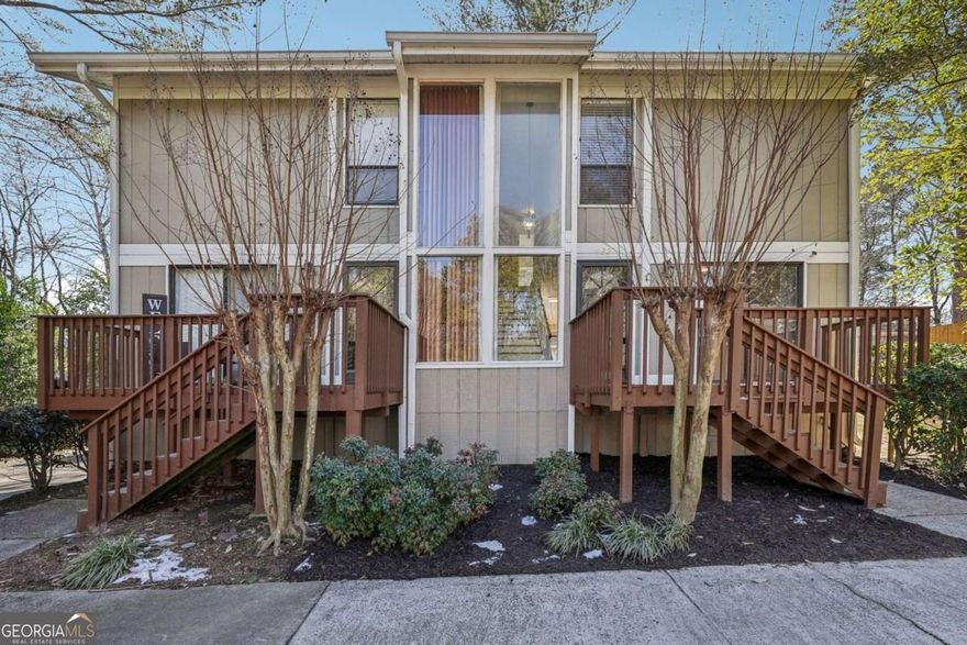Welcome home to this beautifully renovated 2-bedroom, 2.5-bathroom condo/townhome, ideally located just minutes from Interstate 75, Interstate 285, and some of Atlanta's premier destinations, including Cumberland Mall, Truist Park, The Battery, and an array of restaurants and shopping. Whether you're commuting, catching a Braves game, dining out, or indulging in retail therapy, this location offers unparalleled convenience!    Step inside to discover a modern oasis with brand-new finishes throughout. The living and dining areas are perfect for entertaining, with abundant natural light and elegant flooring that complements the home's contemporary design.     The kitchen is a chef's dream, boasting brand-new stainless steel appliances, including a refrigerator, stove, and dishwasher, along with sleek granite countertops and ample cabinet space. Enjoy your morning coffee or unwind in the evening on your private deck, one located in the front of the home and one off the back.    Upstairs, the master suite is spacious and filled with natural light, featuring ample closet space and a fully renovated bathroom. A second bedroom offers flexibility for guests, a home office, or additional living space and offering a full wall of closets and its own bathroom. The laundry area is conveniently located on the 1st floor hall and equipped with a new washer and dryer, making chores a breeze.    With everything completely updated and ready for move-in, all that's missing is YOU! Don't miss your chance to own a stunning home in a prime location.    Schedule a tour today and make this gem yours before it's gone!