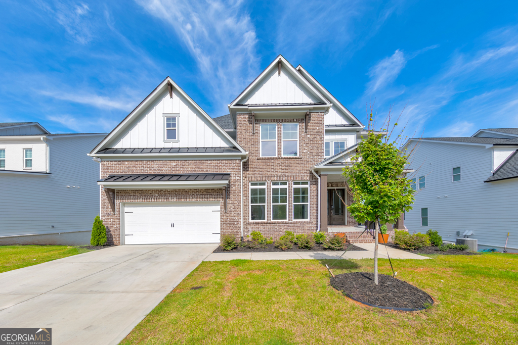 Welcome to this stunning 5 bedroom, 5 bathroom home built in 2024, located in the sought-after Vista Ridge community! A covered front porch welcomes you into a grand two-story foyer. The main level offers an office with French doors, a sunny dining room that flows seamlessly into the modern kitchen featuring a large island with seating, stone countertops, a breakfast room, and abundant cabinet space. The impressive two-story fireside family room is the heart of the home, perfect for relaxing or entertaining. A main-level bedroom and full bath provide a great guest or in-law suite option. Upstairs, the oversized primary suite boasts tray ceilings, a spa-like ensuite bathroom with double vanities, a stunning glass shower, a soaking tub, and a spacious walk-in closet. Three additional secondary bedrooms each feature their own private ensuite bathrooms, and the upper-level laundry room adds convenience. The full unfinished basement with walk-out access offers incredible potential for customization. Enjoy the rear deck overlooking a spacious backyard and the convenience of an attached 2-car garage. Vista Ridge offers fantastic amenities including a community pool, playground, greenspace, and clubhouse. Ideally situated in the highly rated River Ridge High School district, with easy access to Downtown Woodstock's shopping, dining, and entertainment. This home truly has it all-style, space, and location!