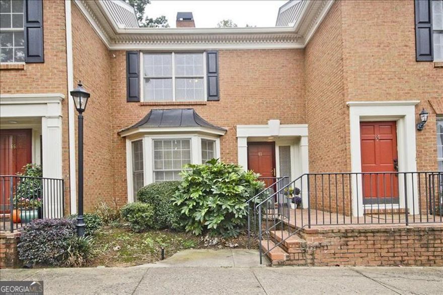 Beautifully maintained townhome in the highly sought-after gated community of Mount Vernon Plantation. This light-filled home features an open floor plan with spacious living and dining areas, hardwood floors, and an updated kitchen with granite countertops, stainless steel appliances, and ample cabinet space. Upstairs offers two large bedrooms, each with its own bath, plus generous closet storage. Step outside to your fenced, private backyard oasis-a rare find in this community-perfect for relaxing, entertaining, or dining al fresco surrounded by lush landscaping. Enjoy community amenities including a pool, tennis courts, clubhouse, and pet-friendly green spaces. Conveniently located near GA-400, I-285, Perimeter Center, shopping, dining, and MARTA. Truly a serene retreat in the heart of Sandy Springs!