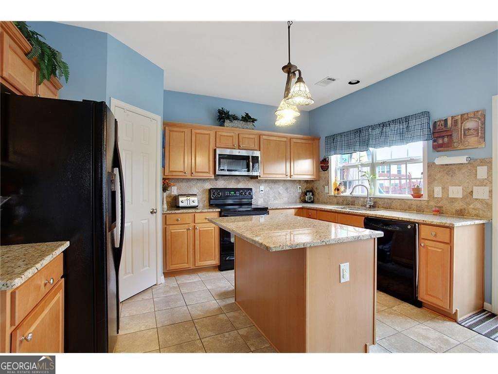 Welcome to this well-maintained, 4-bedroom, 2.5-bath home located in one of the area's top school districts. Featuring an open floor plan with hardwood floors throughout the main level, this home offers both comfort and flexibility. The foyer opens to formal living and dining areas-perfect as flex spaces for a home office or playroom. A separate study on the main level can also be used as a guest bedroom. The kitchen includes an island and flows seamlessly into the spacious family room, making it ideal for entertaining. Upstairs, you'll find a large master suite with tray ceiling, along with three additional generously sized bedrooms. Enjoy a spacious, level backyard-perfect for outdoor activities, entertaining, or family fun.
