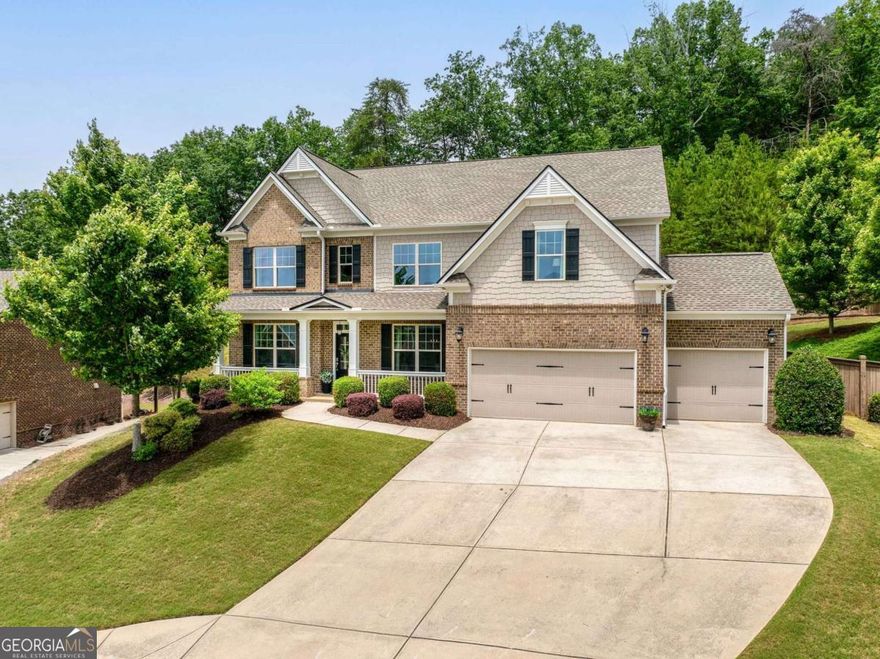Now available in the highly sought-after Wigley Preserve community of Marietta, this stunning 6-bedroom, 4-bathroom home perfectly blends luxury, functionality, and thoughtful design. Situated on a quiet cul-de-sac with a picturesque view, the property boasts a three-sided brick exterior, a spacious three-car garage with loft storage and soaring ceilings, and a private fenced yard with ample room for a pool, playset, or firepit. A new roof and a recently replaced HVAC system add peace of mind, while the large back deckCowith its built-in planters, seating, and a charming gazeboCooffers the ideal setting for outdoor entertaining. Inside, you'll find 9-foot ceilings and hardwood floors throughout most of the main level, along with rich custom woodwork that brings warmth and character to every room. The kitchen is a chefCOs dream, featuring double islands, a custom tile backsplash, and a generous eat-in area that flows beautifully for everyday living and gatherings. Thoughtfully designed custom built-ins enhance both the mudroom and living room, while a large bonus room adds flexible space for work or play. One of the standout features is a second primary bedroom on the main level with its own private ADA accessible en-suite designed for easy accessibilityCoperfect for multigenerational living, guests, a teen suite, or even a playroom. The upstairs primary suite includes a luxurious bath with a soaking tub, separate shower, and a custom closet system for effortless organization. Zoned for top-tier schoolsCoDavis Elementary, Mabry Middle, and Lassiter HighCothis exceptional home delivers space, style, and comfort in one of East CobbCOs most desirable neighborhoods.