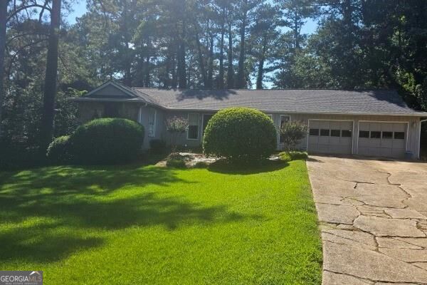 Photo of 1623 Hidden Hills Pkwy, Stone Mountain, GA 30088 (MLS # 10832142)