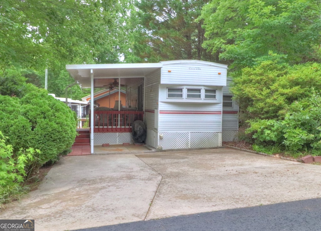 Photo of 62 Hidden Valley Road, Cleveland, GA 30528 (MLS # 10781430)
