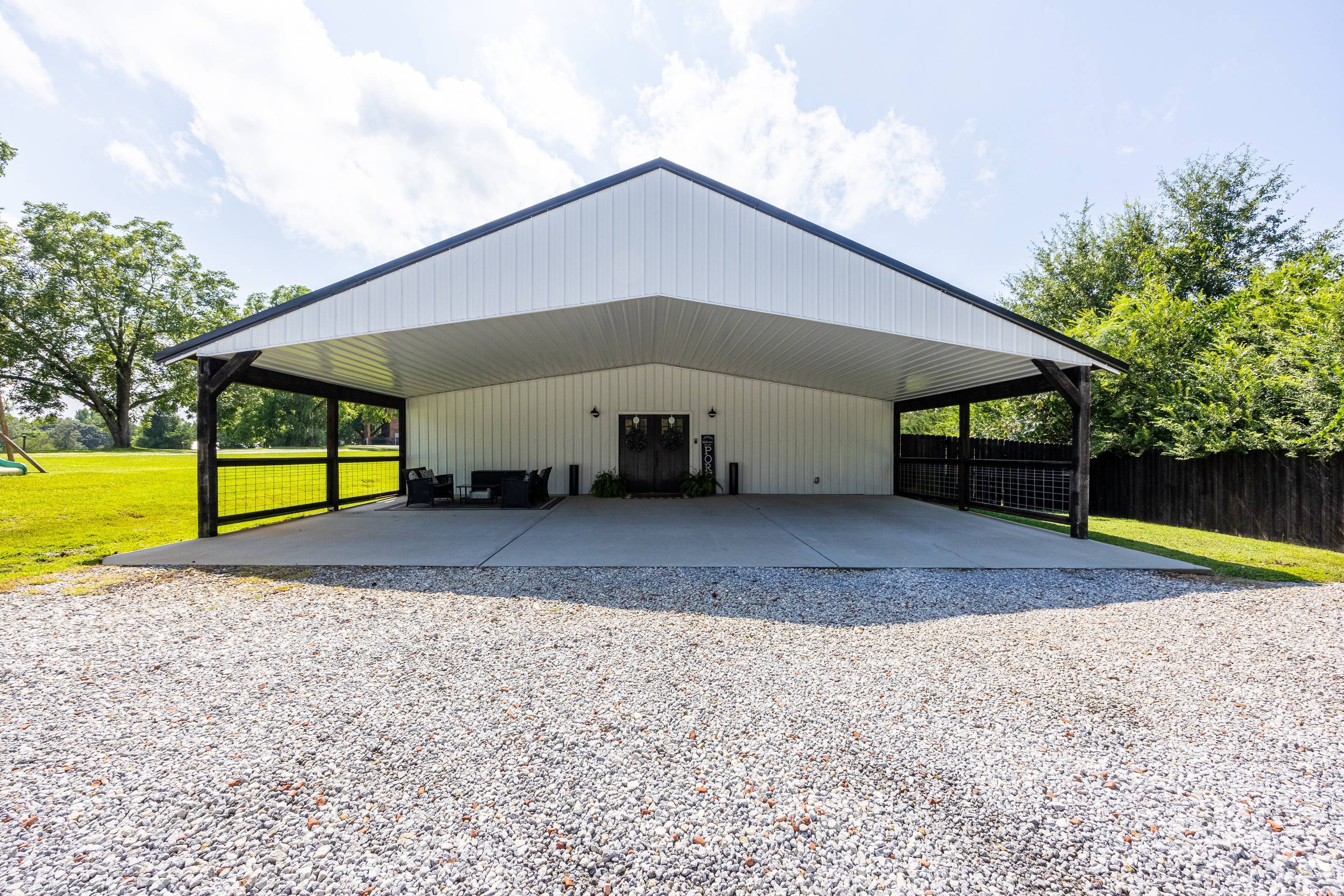 A perfect multi-generational property comes to market! 349 Fort Lamar Rd is a special property hosting 2 like-new homes! Come see this unique property sitting on a picturesque lot in a peaceful Banks County! There are 2 district homes to see! The first home is a 3 bedroom/2.5 bath cabin home with an amazing rocking chair front porch! This floorplan features a large kitchen/living area that's wide open with a vaulted ceiling. The spacious primary bedroom is accompanied by a primary bathroom with dual vanities and a tile shower. This home features a formal dining room and 2 other large bedrooms. There is a greenhouse in the backyard that has been converted to a man cave for watching football games and could easily be converted into a barn for an animal or 2! The beautiful front yard and wooden fencing make a perfect setting for throwing baseball! The second home on this property is a beauty! This 42x128 barn has been converted into a farmhouse barndo you will drool over!!! Huge ceilings greet you as you enter the main living area that showcases the white kitchen, the dark wood toned flooring, and the sharp black countertops! There are multiple rooms that can be repurposed as more bedrooms or offices, the current owner has it set up as 4 bedrooms, with the loft upstairs being a play area. Dark wood tones carry throughout the home in the flooring and the tasteful barn doors. The primary bedroom features a nursery suite with an additional bedroom and full bathroom! There are 2 other bedrooms and a formal office. The 850+- sq ft loft is huge and offers tons of possibilities and has headroom! For those that need storage space, we've got you covered!! 1650+ extra sq ft awaits you in the open garage space! The current owners have built 2 small workspaces in there and still have room to fit multiple vehicles! This property is special and you want to see it! Call me today for more information!!