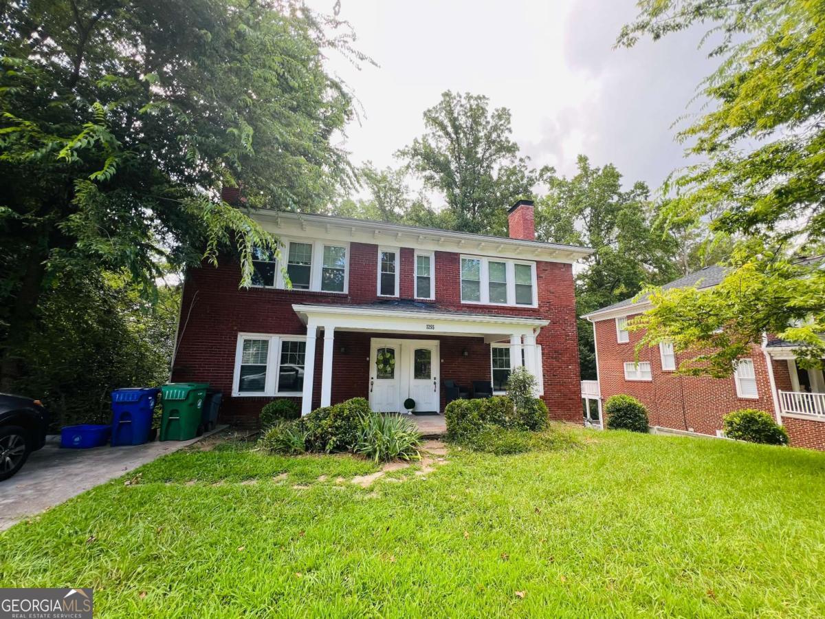 NO SHOWINGS UNTIL Saturday OH - PLEASE DO NOT DISTURB TENANTS. This duplex is an investor's dream: a well-constructed and well-maintained 4-side brick home in a prime Druid Hills/Virginia Highlands location, directly across from Emory's Briarcliff Campus. Property features two mirror-image units, each with 2 stories, 3 bedrooms, 2.5 bathrooms, and a full unfinished daylight basement with private access-ready to finish and generate additional income. Highlights include updated kitchens and baths, hardwood floors, tiled bathrooms, abundant natural light, and laundry rooms in each unit. Roof is only 2 years old, and Unit A has a brand-new HVAC system. An entertainer's deck off the kitchen overlooks the backyard, perfect for relaxing or hosting. Parking pad plus additional rear parking available. Currently occupied by long-term, quiet tenants (2 per unit). Rents are below market but could reach approximately $3,000 per month per unit. With easy access to Virginia Highland, Emory Village, Poncey-Highland, Piedmont Park, top schools, and the BeltLine, this property offers both convenience and strong income potential-an exceptional opportunity for a smart investor.