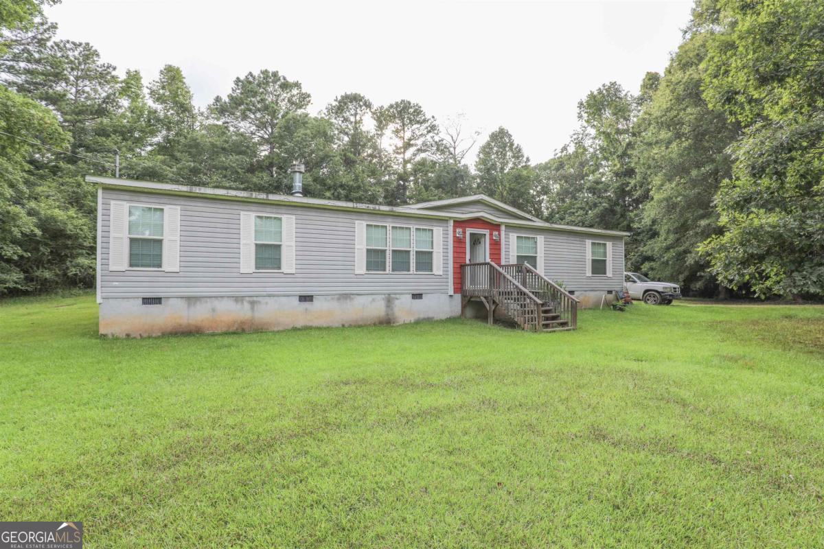 This spacious 4-bedroom, 2-bath home offers loads of open space in a great, quiet Baldwin County neighborhood. Conveniently located near GA Hwy 49, it provides easy access to town while still offering the privacy and peaceful setting you've been looking for. With its ideal location and inviting layout, this home is perfect for comfortable everyday living. Call today to schedule your showing!