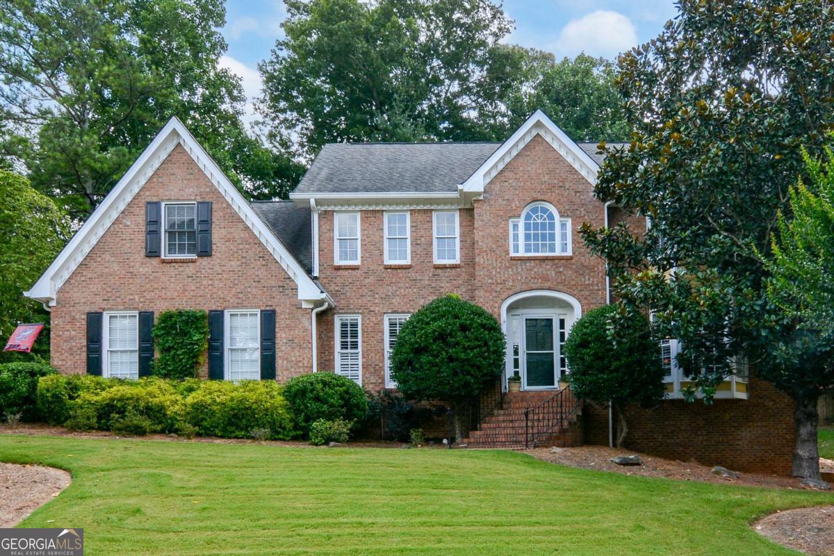 Don't miss this GEM in the heart of Peachtree Corners, the neighborhood is a well established with fantastic amenities and a park with access to the Chattahoochee River. Guys, this is TRULYa chef's kitchen with all custom cabinets (and I mean a LOT of cabinets), beautiful granite, newer appliances, beautiful hardwoods, TONS of light and the counter space is more than most kitchens could dream of! Upstairs the primary suite has a renovated bath with a separate dressing area (ladies, it's your own space to get ready and you'll never have to share a sink or counter space again)! The closet will be the envy of all your friends, it's almost as big as a bedroom and has....drum roll.....custom closets, just like the kitchen. TONS of space for every stitch of clothing you own, heck, you may need to go buy more clothes to fill this guy up! We have 3 additional bedrooms upstairs and two of them share a jack and jill bathroom, it'll be no surprise that the closets in those rooms also have custom closets so there will be no excuse for kids to pretend the floor is their largest shelf. The basement deserves it's own paragraph, the options are endless and while we technically don't have a true bedroom down there, you could totally make one as you'l love the updated full bathroom. Should you not desire your teenagers to become cellar dwellers, you could use the expansive room as a movie theatre, a gym, an office or the world's largest playroom. We currently have a pool. table in the main room, this may stay or go depending on the lucky (some may say smart) recipient who buys this house. if you love to entertain, you'll be thankful that you have a great wet bar down there that is darn close to being a second kitchen. The backyard is level and wide, the screened porch is fantastic for quiet mornings and nice evenings and unlike so many houses, we have not only a big driveway for more cars than you'll want guests but it's been redone and believe me folks, concrete is expensive. Don't wait on this one, someone will swoop her up if you don't!