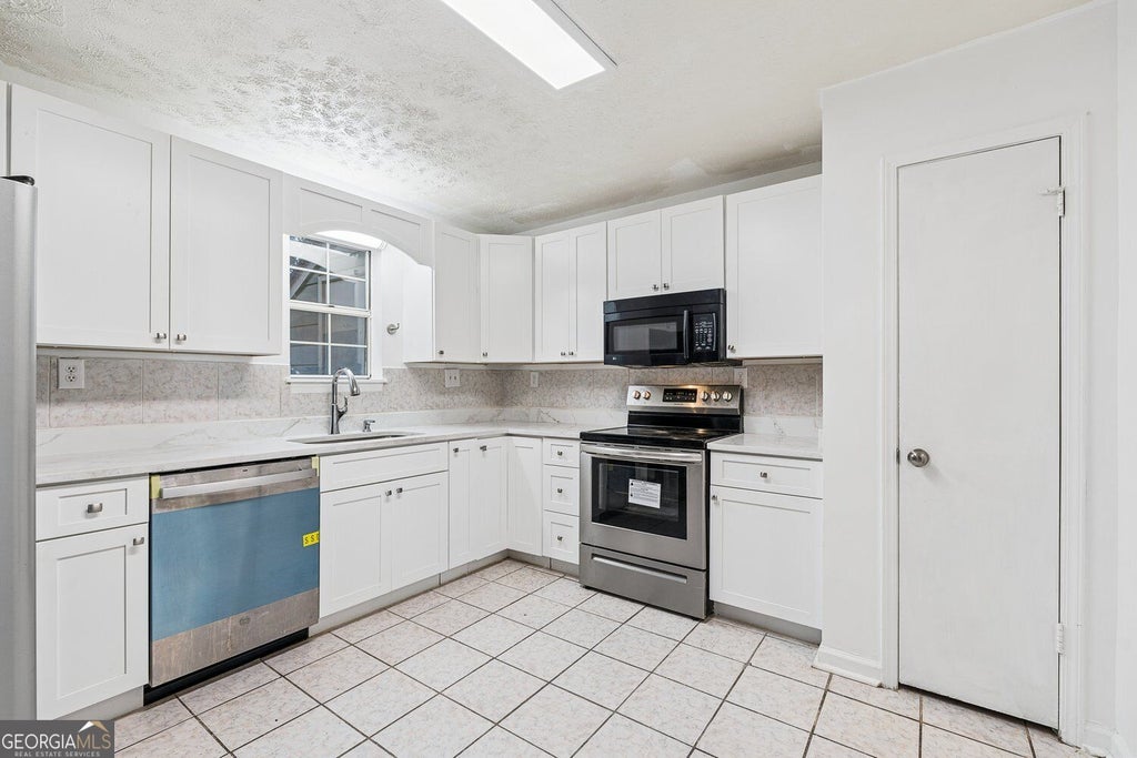 Photo of 101 Vineyard Pond Drive NW, Norcross, GA 30071 (MLS # 10846021)