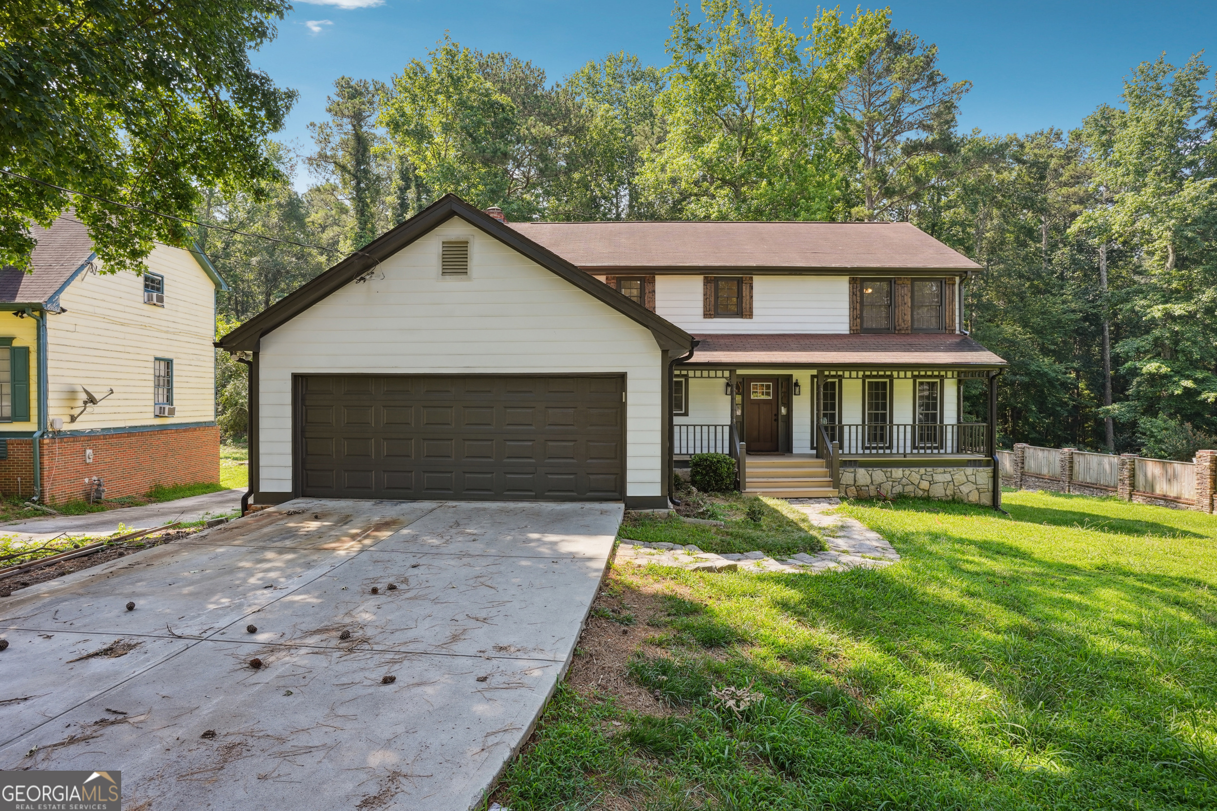 Beautifully renovated and large home in Stone Mountain! This home features new paint inside and out, a finished basement that contains a 5th bedroom and full bath, family room with fireplace, sunroom, eat-in kitchen with breakfast nook, granite counters, stainless steel appliances, formal living room, formal dining room, half bath on main floor, updated master bath and hall bath with large bedrooms! This home is located on a quiet street in Gwinnett County and accepts vouchers! Must have verifiable 2 years of rental history. Income of 2.5 times the rent. No eviction filings, no criminal record. Good credit. Voucher holders must have a min of a 4 bedroom voucher.