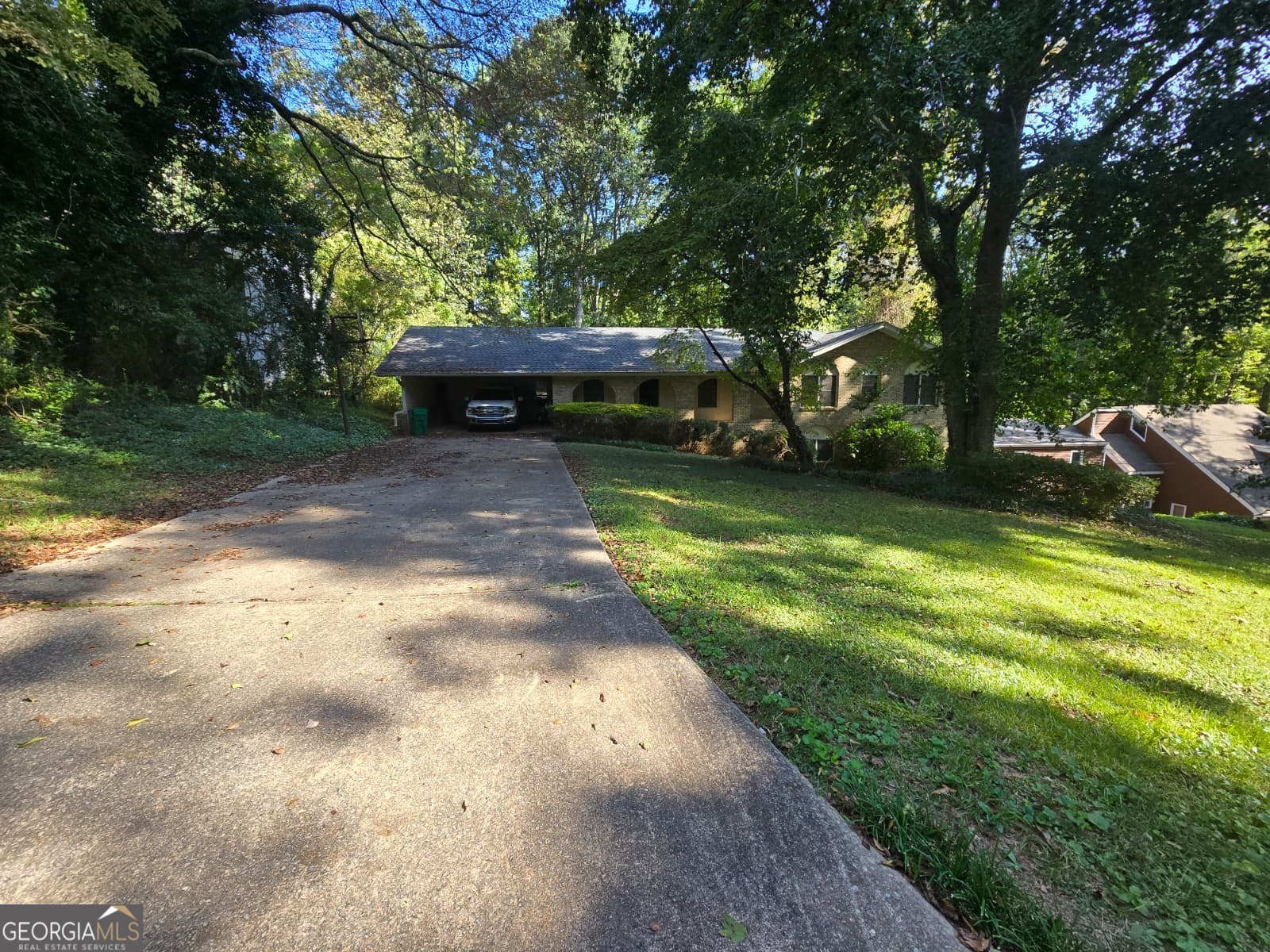 Welcome to 250 Kenilworth Circle, a beautifully maintained 4-bedroom, 3-bathroom brick ranch with a finished basement, nestled in the serene and sought-after Kenilworth Estates. Boasting approximately 2,989 sq ft of living space, this home seamlessly combines comfort, functionality, and recreational luxury for the modern homeowner. Step inside to discover bright, open living spaces with abundant natural light, perfectly suited for both everyday living and entertaining. The main level features 3 spacious bedrooms and 2 full baths, including a generous master suite. The finished basement adds a versatile space with an additional bedroom and full bath, ideal for guests, a home office, or recreational activities. The kitchen is ready to accommodate your culinary ambitions, while the living and dining areas provide ample room for gatherings. The home also includes electric forced-air heating, ensuring year-round comfort. With both a garage and a carport, parking and storage are convenient and flexible. Set on a wooded 0.40-acre lot within a lake community, this property offers peaceful privacy while still being part of an active neighborhood. Enjoy access to community amenities, including a white-sand beach and a swimmable lake stocked with bass and brim, perfect for fishing, boating, or simply relaxing by the water. The exterior is constructed of durable brick with a composition shingle roof, offering both curb appeal and low-maintenance living. Situated on a level city lot, the property is ideal for outdoor activities, gardening, or future expansions. Location is key: just minutes from Stone Mountain's attractions, shopping, dining, and top-rated schools, this home provides the perfect balance of tranquility and convenience. Whether you're looking for a full-time residence or a weekend retreat, 250 Kenilworth Circle is move-in ready and waiting for its next chapter. Don't miss the opportunity to make this exceptional lake-community home your own schedule your private showing today and experience the perfect blend of comfort, style, and recreation in Stone Mountain, GA.