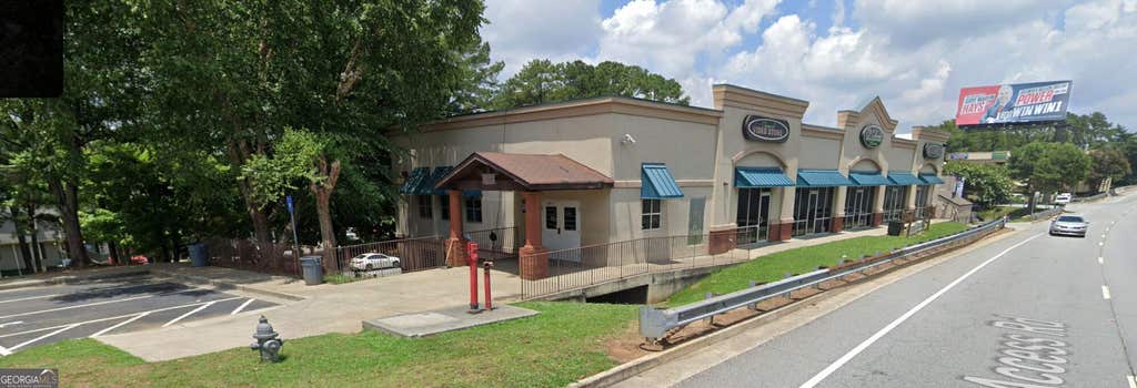 Photo of 2800 Northeast Expressway NE #H, Atlanta, GA 30345 (MLS # 10834625)