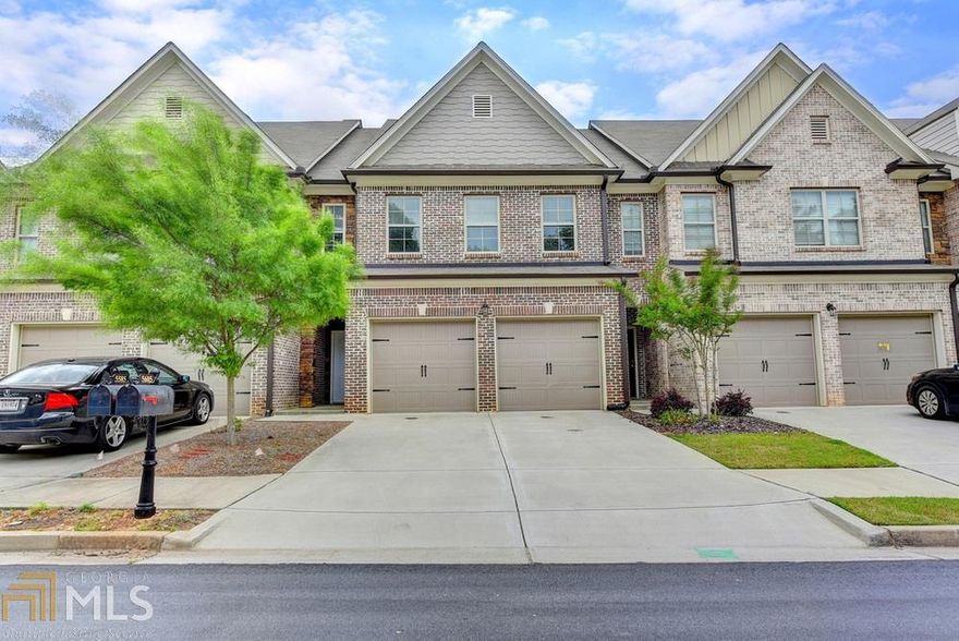 Luxury 2-story Townhome in The Gates at Old Atlanta. Lambert High School. Anderson floor-plan. Hardwood floors on main, gourmet kitchen w/ granite counter-tops, tile backsplash, Stainless steel appliances, tile flooring & surrounds in all bath. Fireplace in family room. All 3 bedrooms upstairs including a spacious owner's suite w/trey ceiling, 2 walk-in closets and laundry room.