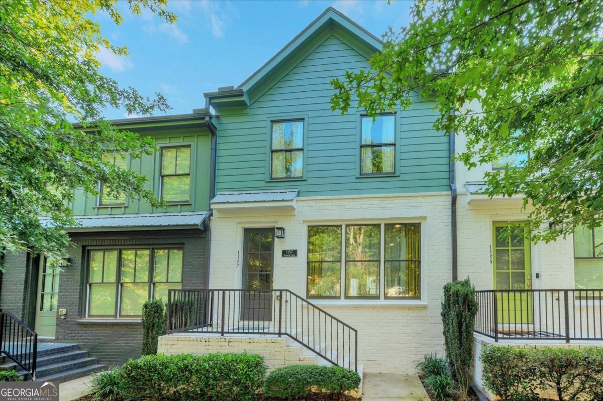 Welcome to this spacious 3-story townhouse in The Swift, offering modern living in the heart of Atlanta. The open-concept main level is designed for both comfort and style, featuring a breakfast bar that flows into the living area, high 10-foot ceilings, and abundant natural light. The kitchen is equipped with ENERGY STAR appliances, a gas range, and sleek finishes, while the upper level highlights two well-appointed bedrooms with ensuite baths, including a primary suite with a double vanity and tiled shower. A third bedroom and full bath on the lower level provide excellent flexibility for guests, office space, or hobbies. Enjoy the convenience of a rear-entry two-car garage, private balcony, and deck for outdoor relaxation. The community offers easy access to the Atlanta BeltLine, public transportation, shopping, and dining, with HOA benefits that cover exterior maintenance, grounds, and insurance. Additional features include central heating and zoned cooling, hardwood floors, and modern security systems. With a home warranty included and FHA approval in place, this property is ready for its next owner to enjoy both comfort and peace of mind.