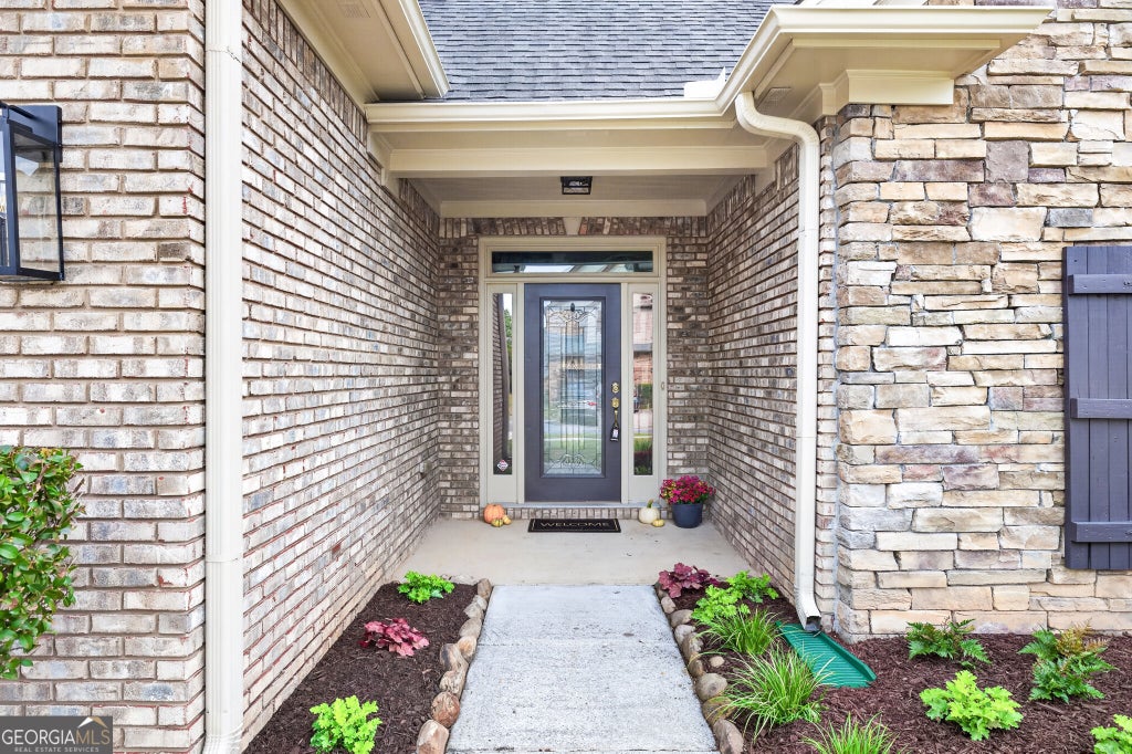 Photo of 1214 Ridge Hollow Lane, Lawrenceville, GA 30043 (MLS # 10866535)