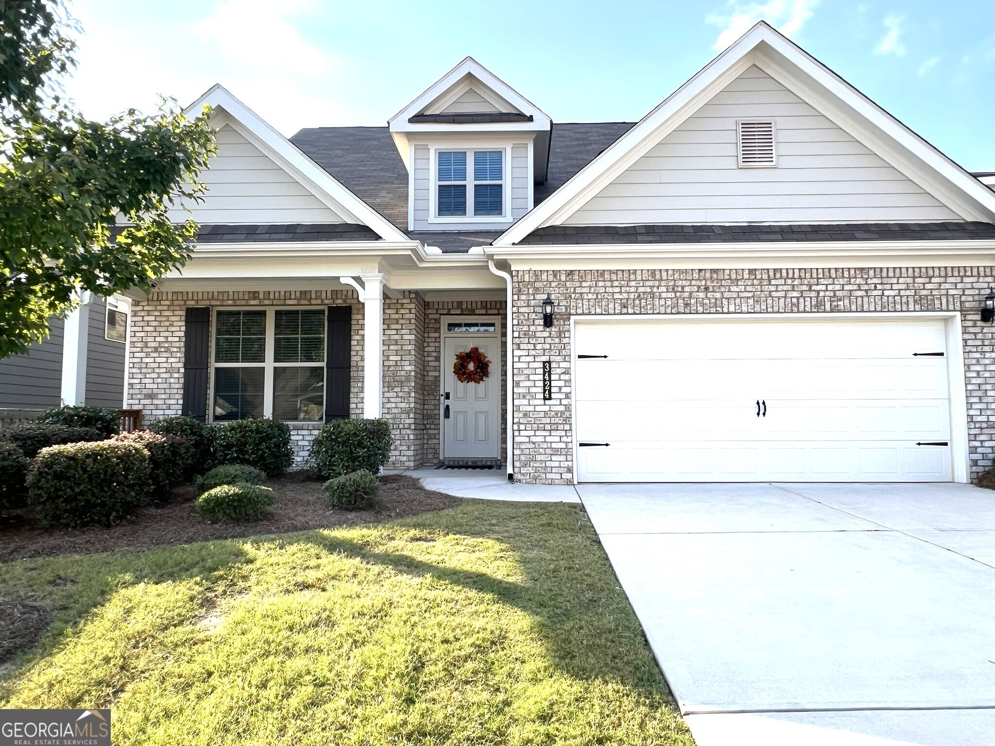 Welcome home to this spacious and open two story home with the Primary BR on the main floor! From the welcoming front porch to the covered back patio, this immaculately maintained home features an entry foyer, formal dining room, eat in kitchen with an oversized island and convenient access to the stepless garage. The separate laundry is right off the kitchen and what a great walk in pantry! With plenty of space for a large table and chairs and an open view to the Great Rm, you'll love the Master bedroom and bath located right down the private hall, just past the guest bath off the Great Rm. Upstairs, you'll find a great space for a playroom or an office and three more bedrooms with a spacious bath. The covered back patio is ready for entertaining and easily accessible to the kitchen! With freshly painted 'Snowbound' walls, new lighting throughout and a touch of champagne bronze added in the kitchen along with other updates, this gently lived in home feels like brand new! The security system and the refrigerator are included! Remember to check out the beautiful community pool, tennis and pickleball courts, dog park and playground! We can't wait for you to see this beautiful home!