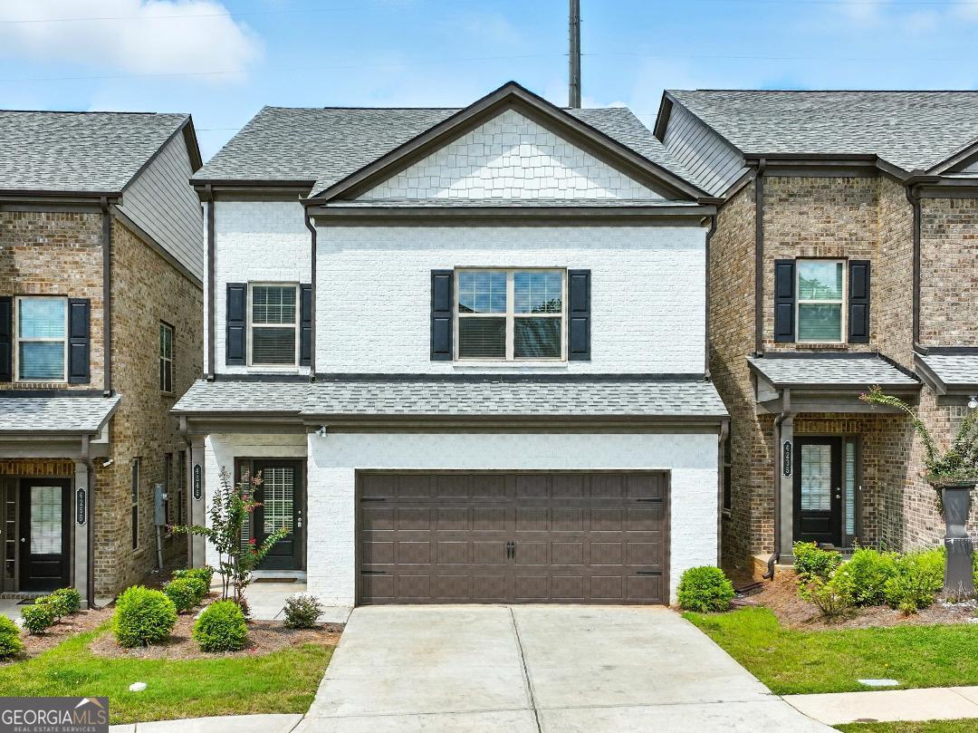 NEW HOME CONDITION! 4 SIDED BRICK! Norcross/Duluth area. 3-story home(family, dining, kitchen, powder room on the main level access to 2 car garage), 4 large bed, 3 1/2 bath. 3rd level with vaulted ceiling, large living room, 4th bedroom, and full bath with windows for maximum natural lighting. Great bonus floor like a basement option. Level lot, extended entry foyer, bright family room with view to level private backyard, open kitchen with view to family room and dining/breakfast room/granite countertops, stainless steel appliances. Spacious master with large bathroom suite w/walk-in closet/double vanity, separate tub and shower. Laundry upstairs. All electric home (no gas). HOA dues includes grass cutting and bush trimming. Minutes to Forum, Gwinnett Mall, City of Duluth, City of Norcross, City of Suwanee, 85, 285, 985, 316. Lots of house for the money. Move-in ready. Easy showing and MUST SEE!