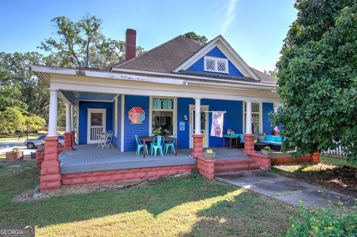 This charming home in downtown Acworth offers a unique opportunity to own a piece of history and make it your own. With its timeless character and beautiful original features, the property is ready for your personal touch, allowing you to carry on the legacy of the historic Trippe House. Situated in the heart of a vibrant, golf cart-friendly community, this property offers a rare chance to own a piece of local heritage. The home itself boasts original features that tell a story of a bygone era. You'll find original hardwood floors and soaring high ceilings, creating a sense of grandeur throughout. The stained glass windows and elegant chandeliers add a touch of timeless beauty. The spacious open-concept kitchen, complete with a kitchen island, is perfect for entertaining. There's also a versatile, flexible room that can be used as a home office or, with a little vision, transformed into an additional bathroom to suit your needs. Imagine living where every day feels like a vacation. You're just a short walk from Lake Acworth and scenic trails perfect for walking or biking. Explore the charm of downtown Acworth, renowned for its award-winning restaurants, unique boutiques, and community center with indoor pickleball courts. Enjoy the lively atmosphere of festivals and the serene beauty of Cauble Park. This isn't just a home; it's a chance to immerse yourself in the heart of a lively and historic community. Don't miss this opportunity to revive a piece of Acworth's past and create your future.