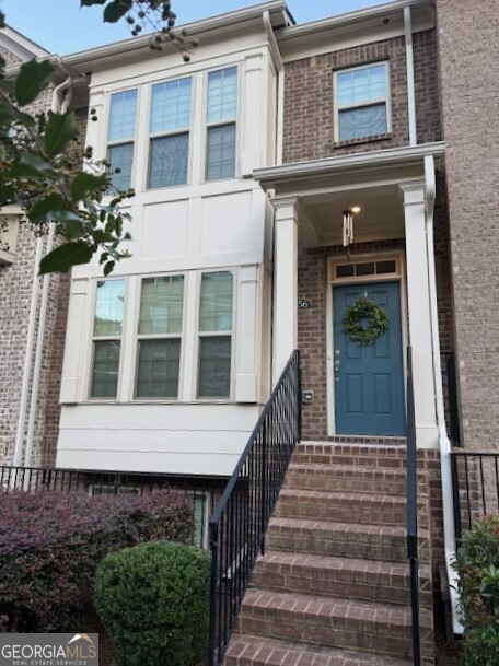 Discover the perfect blend of style, comfort, and convenience in this beautifully maintained townhome, ideally positioned within the highly sought-after Parkside at Mason Mill community. Overlooking one of the neighborhood's charming pocket parks, this residence offers a serene setting paired with modern amenities that make everyday living feel effortless. Step inside to an inviting open floor plan designed with entertaining in mind. The spacious kitchen boasts a natural gas cooktop, abundant cabinetry, and a generous island that flows seamlessly into the dining area and family room. Just beyond, the deck provides the ideal spot for morning coffee or unwinding with friends. Upstairs, the Primary Suite offers a private retreat with a spa-inspired bath featuring dual vanities, a walk-in shower, and separate water closet. Thoughtful upgrades include a near-instant hot water system and spacious walk-in closets for ultimate convenience. Two additional bedrooms, each with its own bathroom, give you ample space for guests. A two-car garage provides plenty of space for storage, shelving, or a workshop. The lock-and-leave lifestyle here is unmatched-your HOA takes care of exterior maintenance, landscaping, and dwelling insurance so you can enjoy the community's exceptional amenities, including a Jr. Olympic-sized pool, fitness center, and clubhouse. The clubhouse hosts a variety of social activities, making it easy to connect with your neighbors.. Bordering 120-acre Mason Mill Park, the community connects you to endless trails, tennis courts, playgrounds, and even ranger-led nature programs. The adjacent dog park ensures your four-legged family members get lots of exercise and playtime. Location is everything, and this home places you just minutes from Emory University and Hospital, the CDC, and the new Children's Hospital. Shopping, dining and entertainment options abound at the nearby Toco Hills Center, just a mile away. Downtown Decatur and Atlanta are both within easy reach, as are major highways for seamless commuting. This townhome offers more than just a place to live-it's a complete lifestyle. Come experience the best of Parkside at Mason Mill and make this stunning residence your next home.