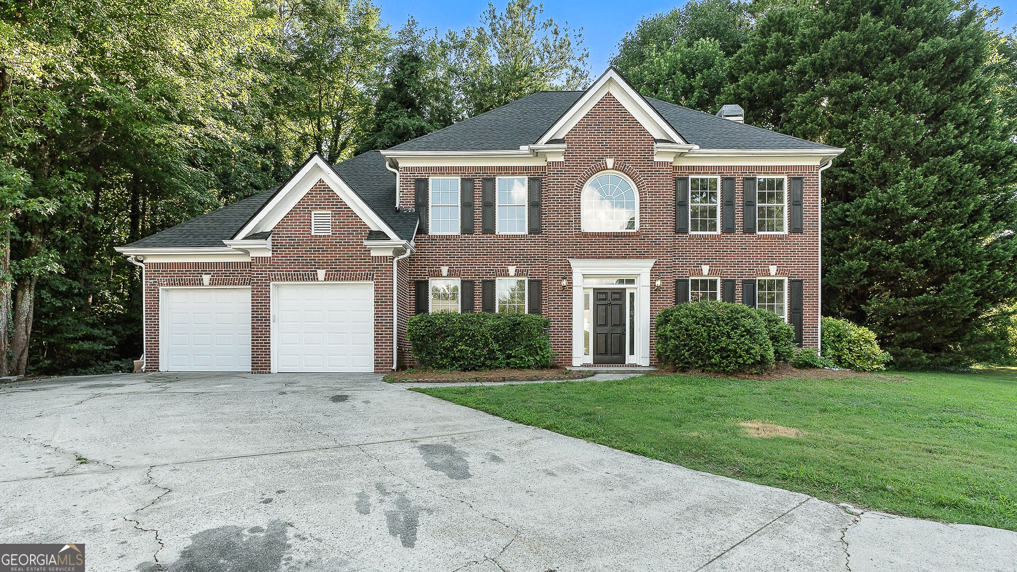 Welcome home to this beautifully updated 4-bedroom, 2.5-bathroom traditional residence tucked away on a quiet cul-de-sac lot in the highly sought-after Peachtree Ridge school district. From the moment you step into the impressive 2-story foyer, you'll notice the care and thoughtful upgrades that make this home truly move-in ready. The main level offers a perfect blend of functionality and elegance, featuring a formal living room with built-in shelving- ideal for a library, home office, or sitting room-and a formal dining room that flows through a convenient butler's pantry into the kitchen. The spacious kitchen boasts white cabinetry, brand-new quartz countertops, a new sink, stainless steel appliances, a large walk-in pantry, and a breakfast bar-all open to the family room with fireplace, creating the perfect space for entertaining and everyday living. Upstairs, the primary suite offers a tranquil retreat with a tray ceiling, walk-in closet, and a spacious en-suite bath featuring a double vanity, jetted tub, and separate shower. Three additional well-sized guest bedrooms share a full bath. Recent upgrades include a new roof, fresh interior paint, new carpet, and new LVP flooring-providing both comfort and style throughout. Step outside to the private backyard, offering space for play, gardening, or relaxing evenings on the patio. Conveniently located near shopping, dining, Hwy 316, and top-rated schools, this home combines comfort, location, and updates in one stunning package. Don't miss your chance to own this exceptional home in a well-established neighborhood-schedule your showing today!