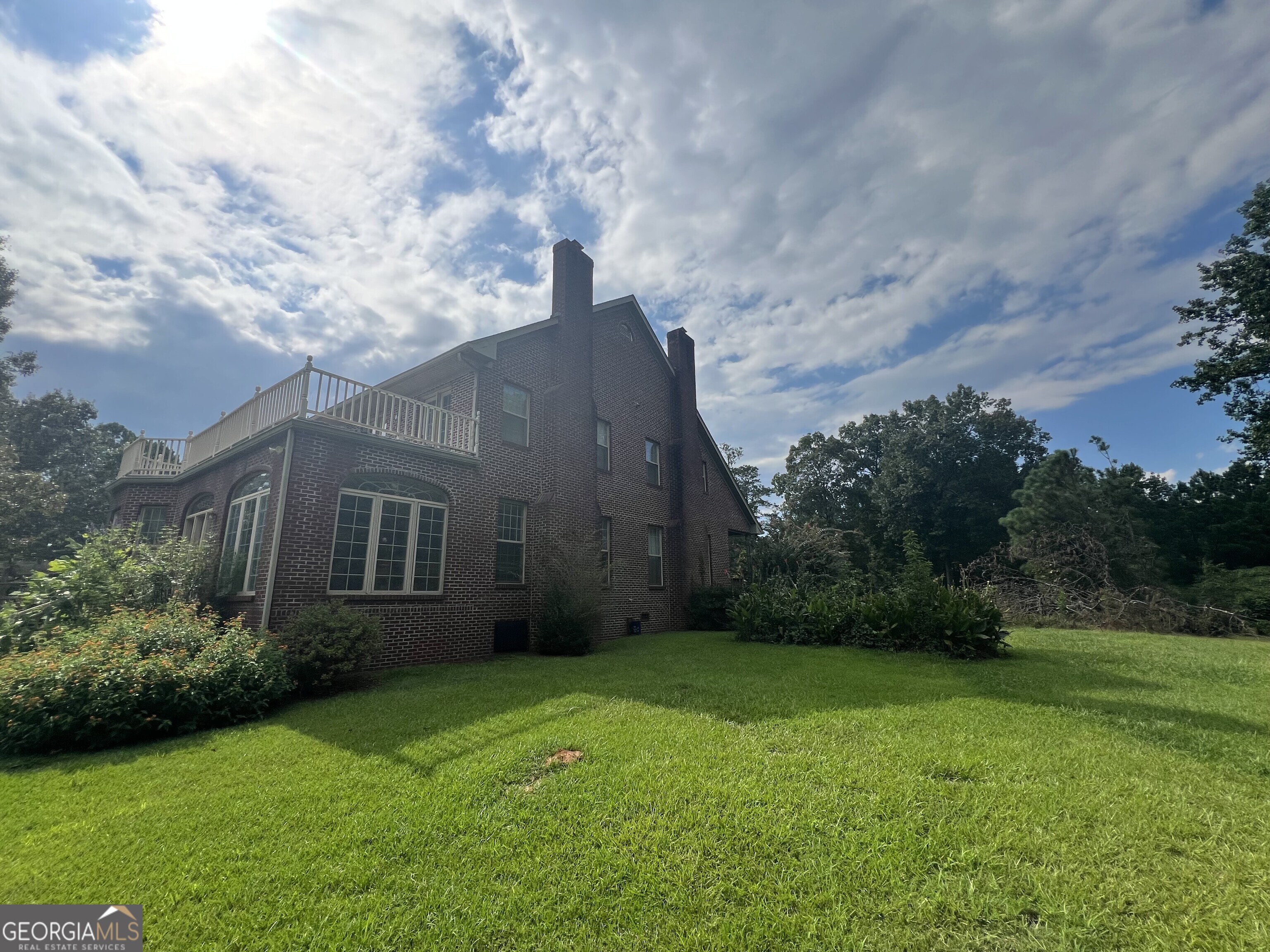 Huge home on 10+ acres!! This spacious 5 bedroom / 3.5 bathroom , 4-sides brick home offers over 4,800 square feet of living space and is ready for your personal touch. Set on 10+ private acres, this home offers the privacy you desire while being just 10 minutes to the downtown district. Bring your vision and make it your own with the cosmetic updates possible through this deeply discounted asking price. Where else are you going to find this size, privacy, and convenience in one home? Don't miss this incredible opportunity!