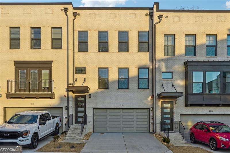 Discover modern elegance in this beautifully designed townhouse, featuring a bright, open floor plan perfect for entertaining. Tenant only pays for electric, gas and water is taken care of by the owner. The main level boasts gleaming hardwood floors throughout, a chef-inspired enormous kitchen island with quartz countertops, stainless steel appliances, and a seamless flow to the living area. Step outside to your spacious back deck-ideal for relaxing or hosting gatherings. Upstairs, you'll find three bedrooms, including a luxurious primary suite with a spa-like bathroom, complete with a large walk-in shower and an oversized walk-in closet. The upper level also features a secondary bathroom, perfect for the additional bedrooms. The lower level offers a versatile bonus room with a full bathroom and access to a charming back patio, perfect for enjoying outdoor space. The level also provides direct access to the 2-car garage. Nestled in the amazing Easton community, this home is conveniently located near shopping, dining, and top-notch amenities.