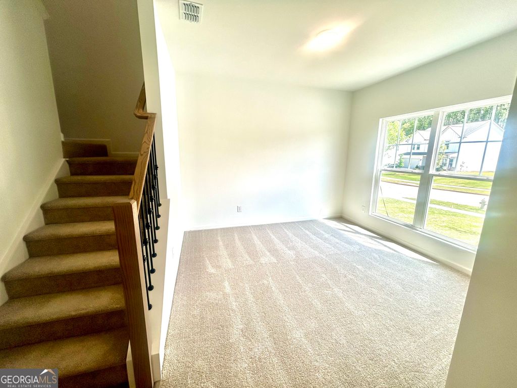 Photo of 5372 Heron Bay Boulevard, Locust Grove, GA 30248 (MLS # 10758883)