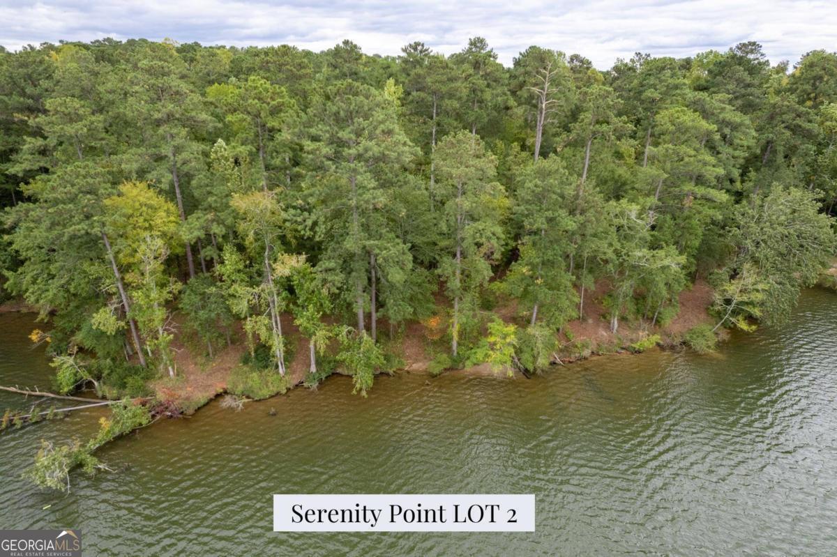 Here is your chance to be a part of something special. Serenity Point is Lake Sinclair's newest lakefront subdivision. Consisting of ten newly-released lakefront lease lots, Serenity Point boasts sprawling lake views, phenomenal boating and fishing opportunities, and all the pleasures that lake life brings. Conveniently located less than ten minutes from the area's best dining, retail shopping and grocery stores, you do not have to compromise on lake life and convenience. Each lot offers well over 100 feet of shoreline making them eligible for a double stall boathouse. Seeking tranquility and peace of mind? Since short-term rentals are not permitted at Serenity Point, you can rest assured your investment isn't burdened with new neighbors every weekend. Serenity Point is destined to be one of Lake Sinclair's most sought after neighborhoods. Don't let this moment pass, call today to learn how you can be a part of this incredible opportunity! Lot 2 offers beautiful views and sits on 1.34 acres. Build a double stall boathouse, and enjoy over 107 feet of shoreline fun. Serenity Point is located less than a mile off Mays Rd.