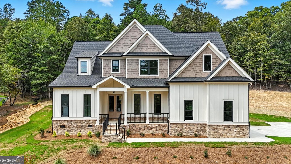 The Garrison Pointe plan offers a spacious and versatile layout perfect for today's lifestyle. This thoughtfully designed home features a primary suite on the main level, along with a separate dining room and a full guest bath-ideal for entertaining or accommodating guests. Upstairs, you'll find three generously sized bedrooms, including one with a private ensuite bath, plus an oversized media room for flexible living space. Located in the sought-after Hampton Preserve neighborhood, this home is within a desirable school district and just 15 minutes from downtown Rome, offering convenient access to shopping, dining, and entertainment. We have other lots and plans to choose from, and can customize any plan. Ready to move in. Some options may vary as we are custom builders. Ask about our $5,000 closing cost incentive OR Temporary Rate Buydown when you use our preferred lender, Matt Garcia w/ Supreme Lending.