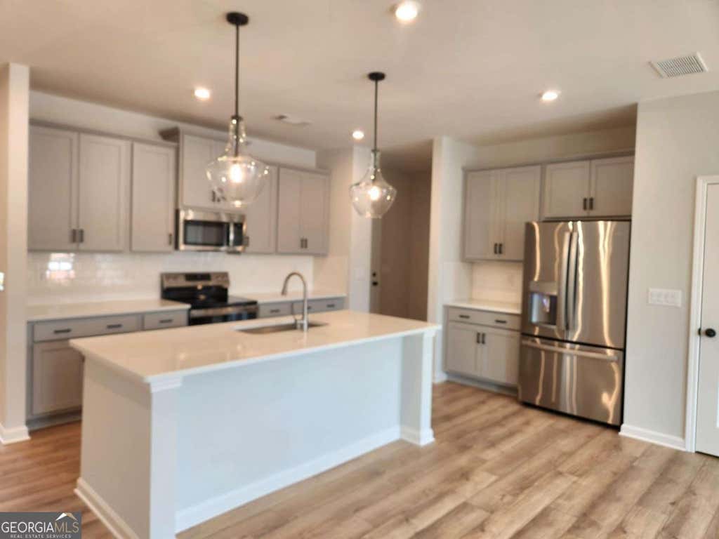 Photo of 848 Leraes Way, Loganville, GA 30052 (MLS # 10784145)