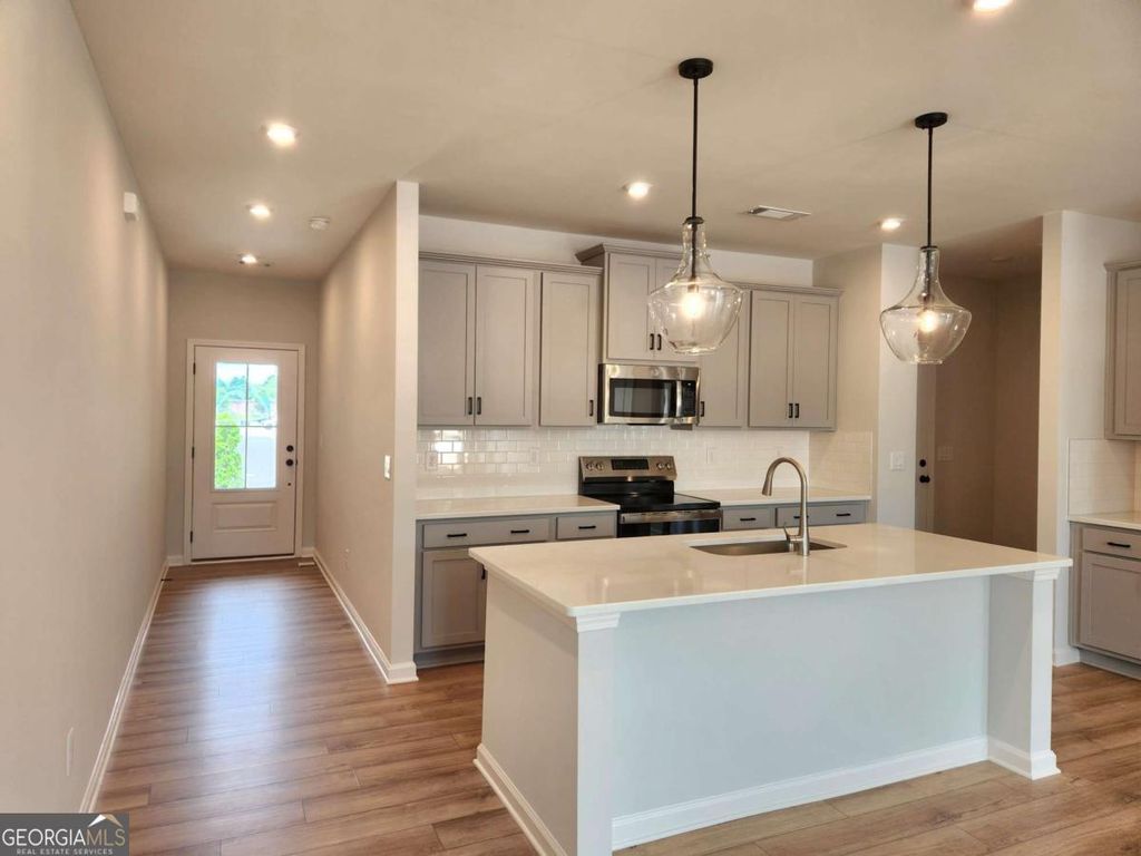 Photo of 848 Leraes Way, Loganville, GA 30052 (MLS # 10784145)