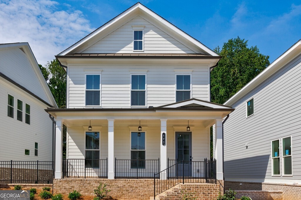 Welcome to Brackley - Cumming's premier new community where modern living meets convenience and lifestyle! Just one mile from GA 400 and minutes from City Center, this home offers unbeatable access to shopping, dining, and entertainment, with Lake Lanier only a short drive away. Residents also enjoy fantastic community amenities including a sparkling pool and a dog park, perfect for both relaxation and recreation. Step inside The Greenville, a thoughtfully designed single-family home with open-concept living and high-end finishes throughout. The terrace level offers a private bedroom with a full bath, perfect for guests or a quiet home office. On the main level, soaring 10-foot ceilings and 8-foot doors create a bright, airy feel. The chef's kitchen is a showstopper, featuring a massive island, 42" white cabinetry, herringbone tile backsplash, stainless steel farmhouse sink with sleek black hardware, and a seamless flow into the spacious family room with a modern linear fireplace. A large deck off the back is ideal for entertaining or simply enjoying a peaceful evening outdoors. Upstairs, retreat to the luxurious primary suite with a spa-like bath boasting dual vanities, a freestanding tub, a separate glass shower, and an oversized walk-in closet. Two additional bedrooms share a stylish hall bath, while the laundry room is conveniently located nearby. Even better lawn care is included with the HOA, giving you more time to relax and enjoy all that Brackley has to offer. This home combines elegance, comfort, and low-maintenance living in one of the most desirable new communities in Cumming. Don't miss your chance to lease this beautiful home schedule your private tour today!