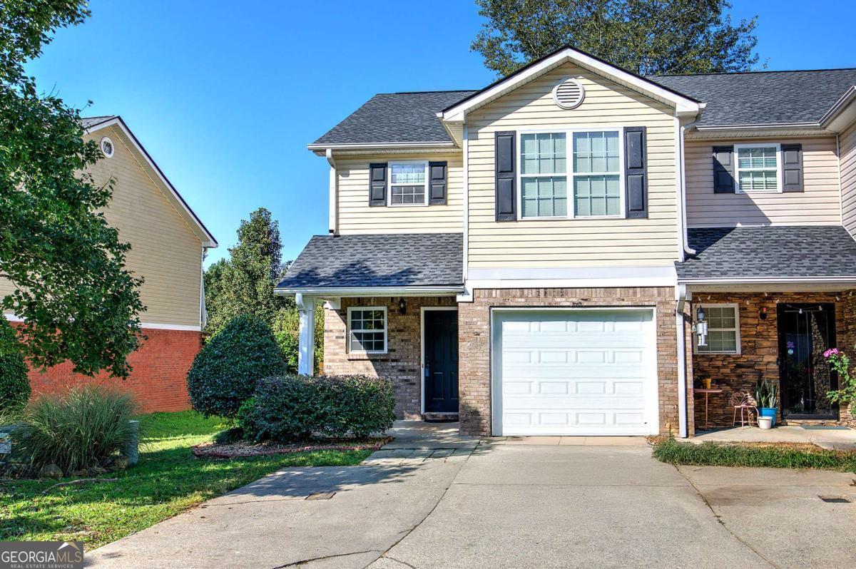Rare Opportunity! Spacious 3 bedroom 2.5 bath end-unit townhouse in a highly desirable community with great amenities - pool, clubhouse, tennis courts, and lawn care included. Featuring a brand-new roof and fresh flooring on the main level, this home is truly move-in ready. The open-concept kitchen and living room flow seamlessly to your private, fenced backyard - perfect for relaxing or entertaining. Upstairs you'll find an oversized master suite with generous closet space, plus two additional bedrooms. Conveniently located close to city schools, this townhouse checks all the boxes. Why rent when you can own for less? Don't miss your chance to call this beautiful townhouse home!
