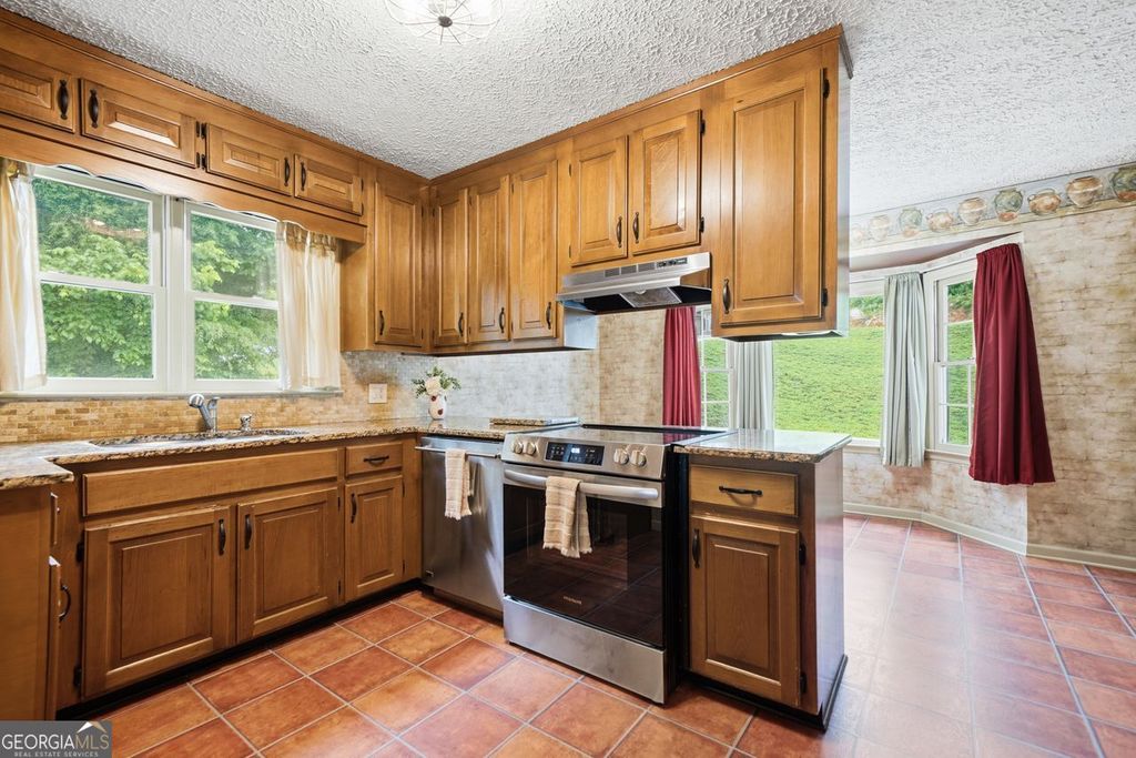 Photo of 4269 E Cherokee Drive, Canton, GA 30115 (MLS # 10765704)