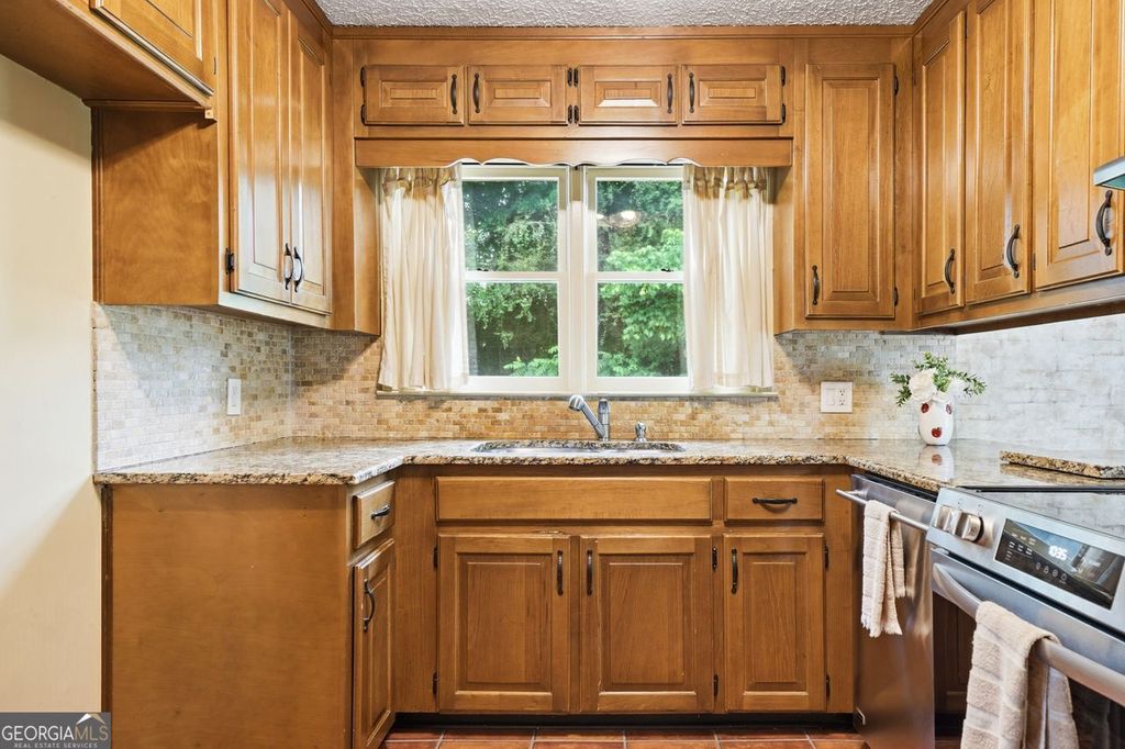 Photo of 4269 E Cherokee Drive, Canton, GA 30115 (MLS # 10765704)