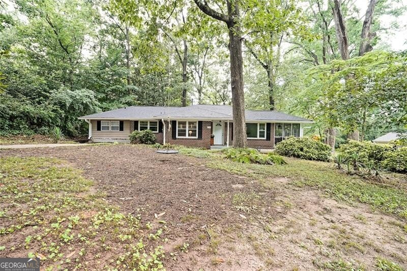 Charming Midway Woods 1951 Brick Ranch - Move-In Ready with Room to Grow! Welcome to this delightful 1951 brick ranch, nestled in the heart of the highly sought-after Midway Woods neighborhood. Over the years, this home has been thoughtfully renovated and expanded, blending original character with modern updates to create a warm and inviting atmosphere. Known for its quirk, charm, and friendly neighbors, this location offers the perfect balance-just a short stroll to Decatur and Avondale Estates, but without the added city taxes! This home offers sought-after single-story living, featuring a spacious primary suite with an attached ensuite bathroom, as well as two additional generously sized bedrooms and a well-appointed hall bathroom. The home has a brand-new roof, giving you peace of mind, while the freshly refinished original hardwood floors add classic charm throughout. The interior has been freshly painted, creating a bright and inviting space that is move-in ready. Enjoy outdoor living with a screened porch, back deck, and a spacious, fully fenced backyard-perfect for pets, play, or gardening. The kitchen offers plenty of space with ample countertops and cabinetry, making it perfect for cooking and entertaining. This home is move-in ready as-is, offering a blend of character and functionality. However, with a little cosmetic renovation, you can easily personalize it to suit your style. And with a large lot (200' x 82'), there's plenty of room to expand-whether you're dreaming of pushing back or building up to create your ultimate vision of home.