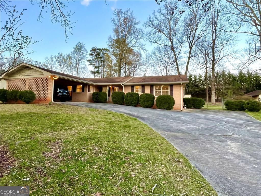 Photo of 4457 Frontier Way NE, Sugar Hill, GA 30518 (MLS # 10718647)