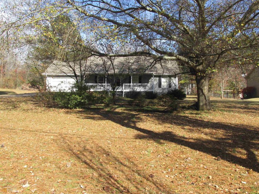 Investors, take a look at this cozy 3 bedroom 2 bath home on appx .62 acres waiting for your special touches. Living room with fireplace, eat in kitchen with stained cabinets, laundry room. 2 secondary bedrooms share the hall bath, and the master has a private bath. This home is ready for your updates! Enjoy the spring and summer on the covered front porch!