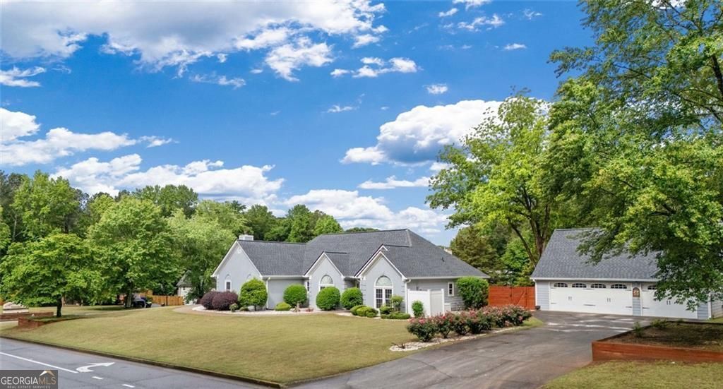 Photo of 5391 Brownwood Drive, Powder Springs, GA 30127 (MLS # 10762360)