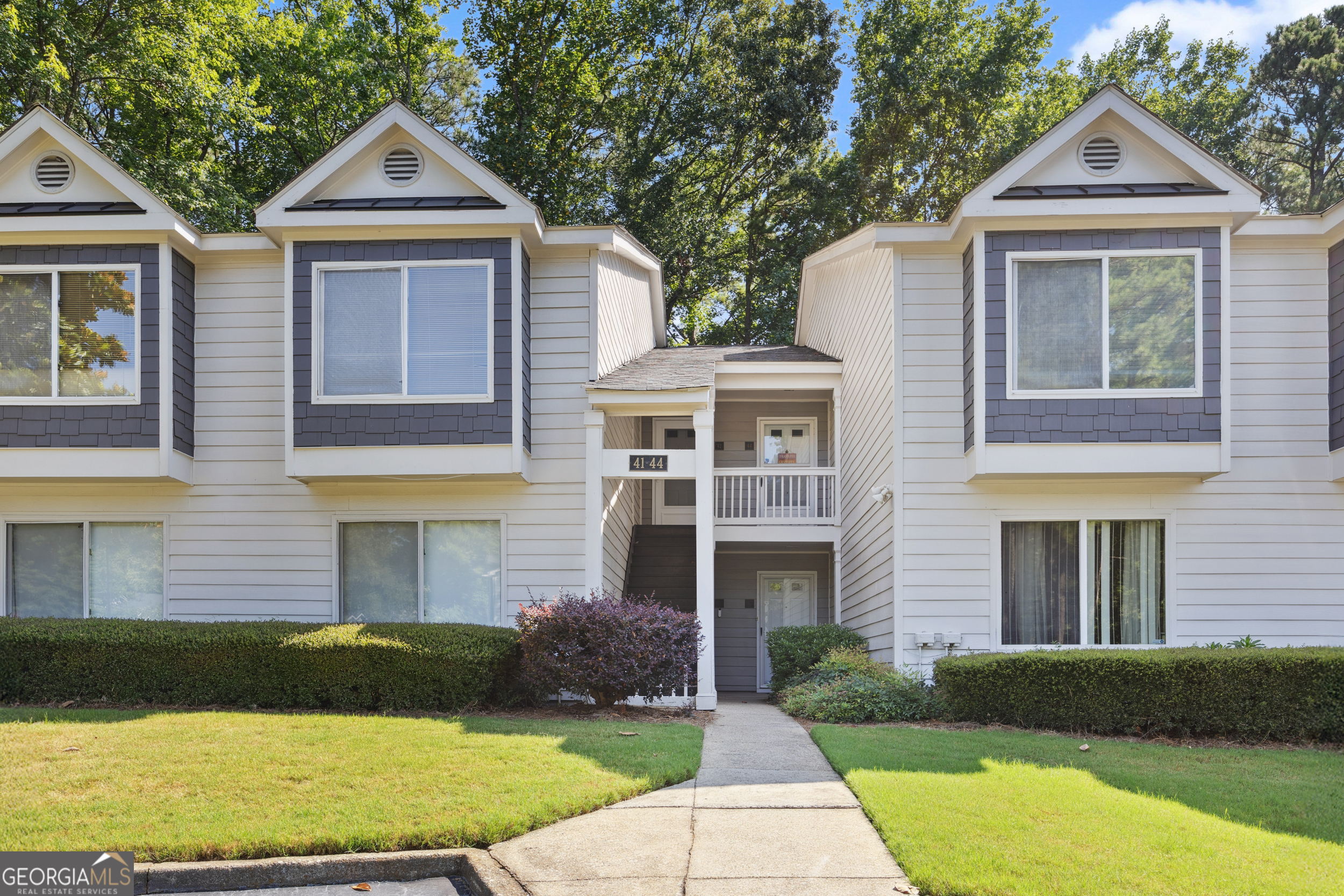 Beautifully renovated upper-level end unit in a well-established, mature neighborhood. This spacious home features two oversized bedrooms with charming bay windows, offering plenty of natural light. Enjoy modern updates throughout. Conveniently located just minutes from I-285, I-75, and GA-400 - providing easy access to Buckhead, Downtown Atlanta, and the airport. Don't miss this exceptional opportunity in a sought-after area! Home qualifies for 100% financing. No rental restrictions.