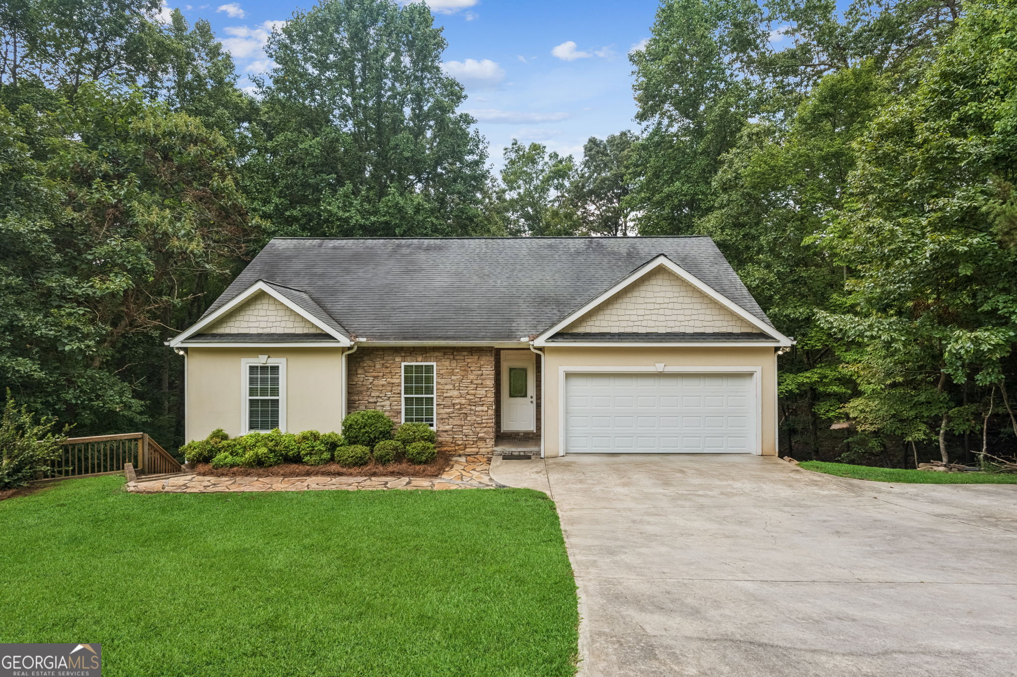 Welcome to 516 Golden Avenue in the ever popular Dahlonega, GA. Perfectly positioned in the rolling foothills of North Georgia, this remodeled four bedroom, three bathroom, roommate plan is more than just a home-it's a gateway to a lifestyle defined by natural beauty, Southern hospitality, and timeless charm. This exceptional property blends classic design elements with modern amenities, offering an idyllic retreat for families, professionals, or anyone seeking to embrace the unique spirit of Dahlonega. What's great about this property: Located on Golden Avenue one of Dahlonega's most sought after areas; minutes to the charming downtown square, the University of North Georgia, local wineries, award winning restaurants, and the hiking trails and reservoir at Lake Zwerner and the Yahoola Creek Reservoir; 10 minutes to GA 400 for access to the Dawsonville Outlet Mall, medical facilities, and other amenities further south in the north metro area; 90 minutes to Atlanta - Far enough to get away from the big city, but close enough when needed; fully finished basement with a second full kitchen, full bathroom, bedroom, and living room; close to tons of outdoor recreation sites for camping, hiking, fishing, river tubing, and taking in the beautiful mountain views; and it has plenty of parking for the basement living area and the top main floor. 516 Golden Avenue offers over one acre of land and 2256 square feet of living space, plus a fully finished basement living area that could be a downstairs apartment or additional living space for a family, makes this home perfect for investors, families, couples, or a single person. This home has great curb appeal and has been meticulously maintained. Two outside decks offer the tranquility of the wooded setting and quiet street for morning coffee, outdoor dining, or just taking in nature. Homes like this don't come along often in Dahlonega, so don't miss this opportunity to own a beautiful home in one of the most sought after towns in North Georgia.
